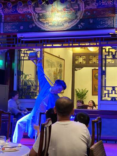 A dancer performing in the restaurant