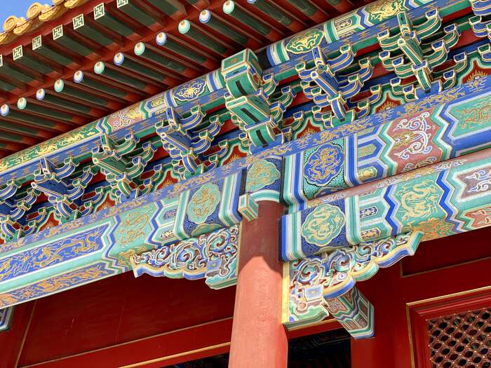 Colourful painted eaves on a temple building