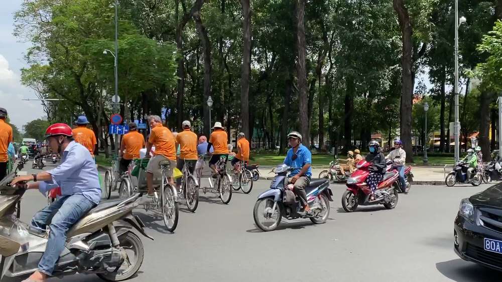 First-person view of road traffic while riding on a Cyclo