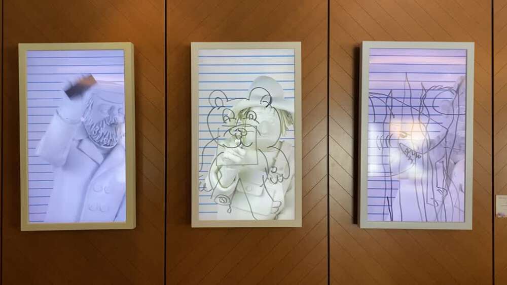 Artwork with animated picture frames