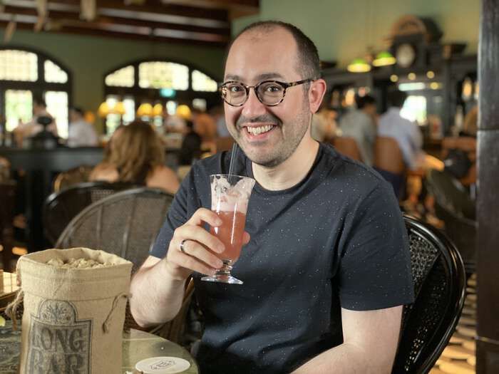 Zarino drinks a Singapore Sling at the Long Bar